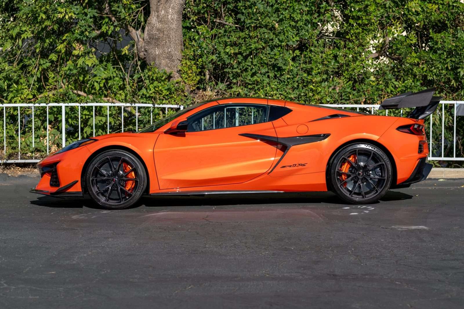 Side profile of the Sebring Orange 2027 Chevrolet Corvette ZR1X coupe