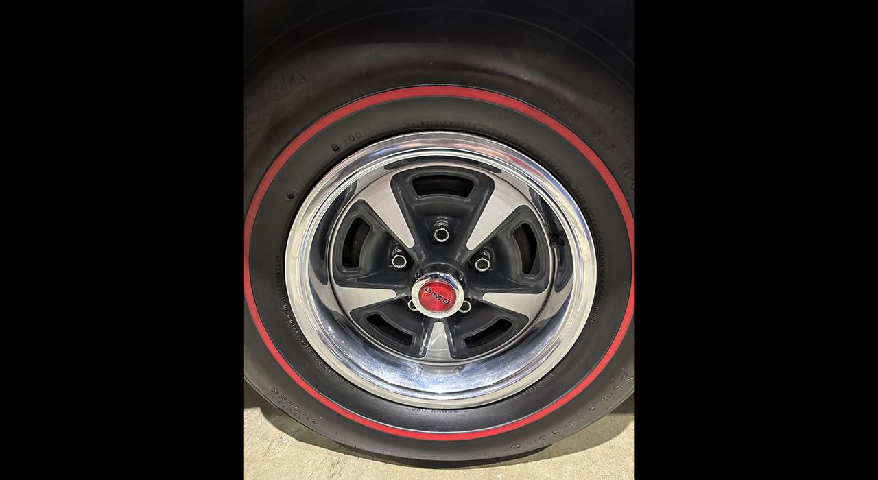 Rally II wheel with redline tire on the 1970 Pontiac GTO