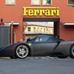 The only Ferrari Enzo delivered new from the factory in matte black (Nero Opaco), chassis 136069, outside Maranello