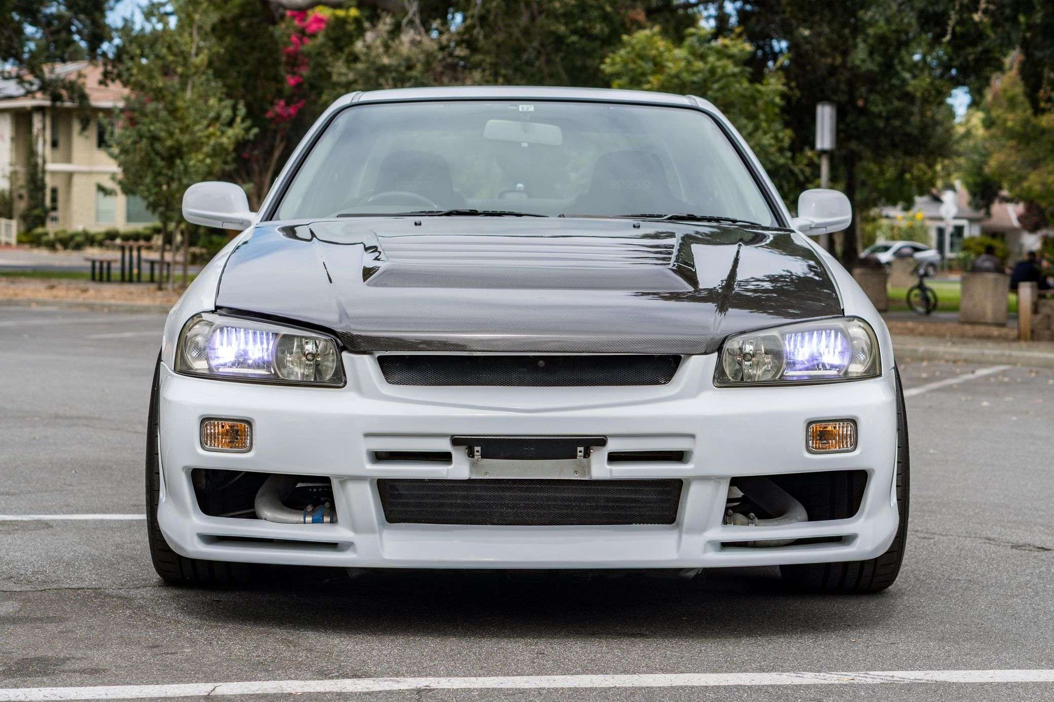 A Modified R34 Skyline Sedan on Cars & Bids Shows Where the JDM Market Draws the Line - featured image