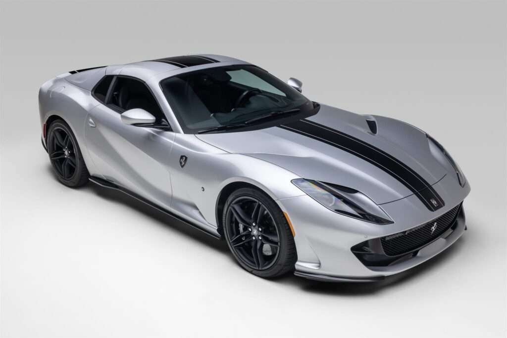 2021 Ferrari 812 GTS front three-quarter view with hardtop raised, for sale on Bring a Trailer