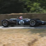 An AAR Eagle Mk I Formula 1 car at speed on the hill at the Goodwood Festival of Speed