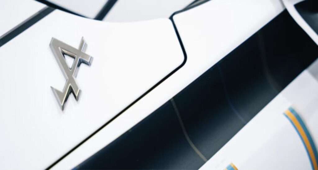 Close-up of the Alpine badge set into Trevor Jackson's design surface on the one-off A390