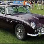 Today in Collector Car History: The Aston Martin DB5 Becomes Bond's Car 1964 Aston Martin DB5 in Roman Purple at London Concours, the model made famous by Goldfinger