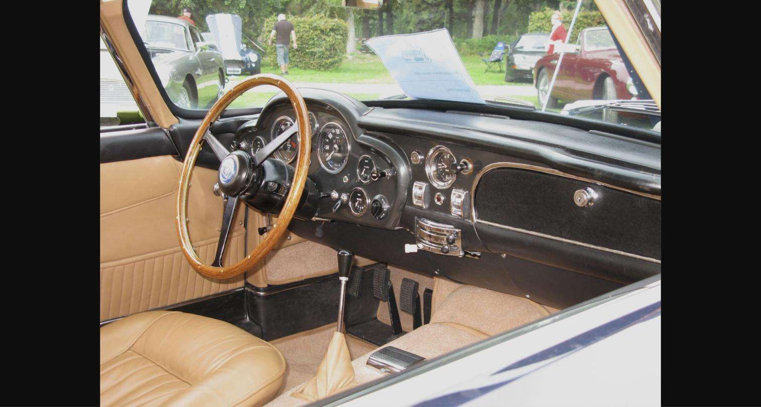 Aston Martin DB5 wood-rimmed steering wheel and dashboard