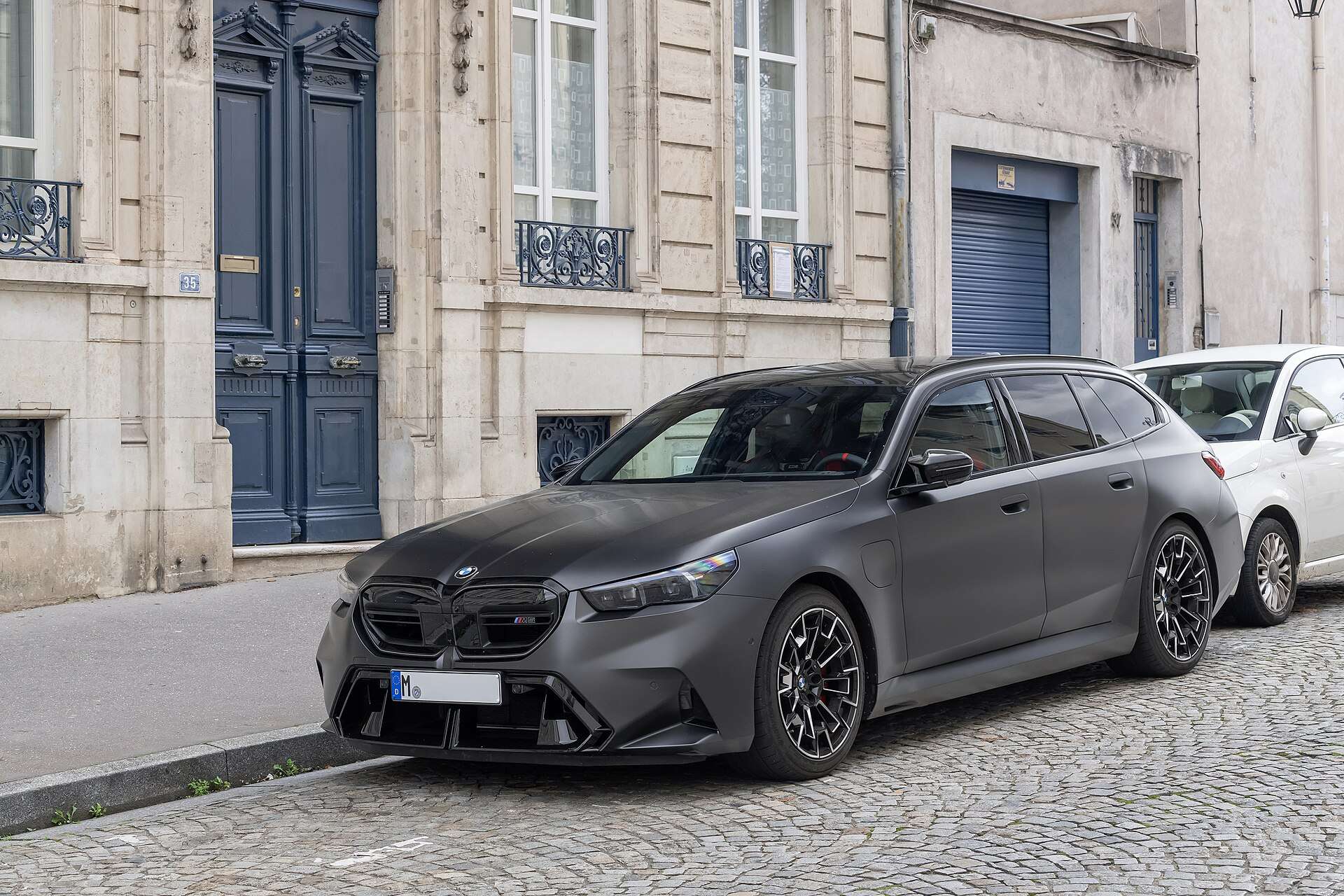 BMW M5 Touring G99 station wagon parked outdoors