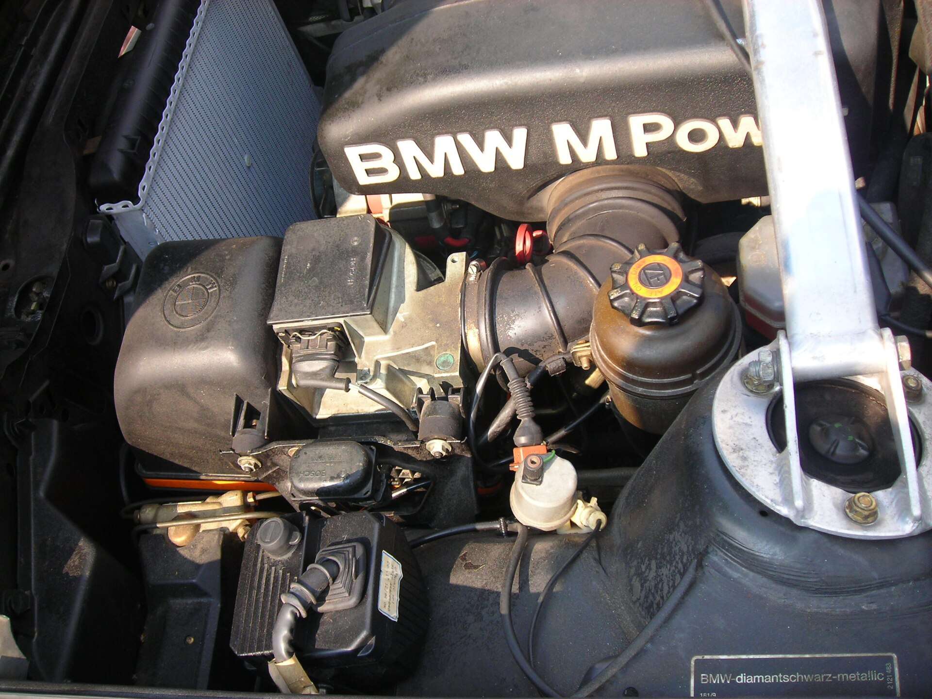 BMW S14B23 twin-cam four-cylinder in its engine bay