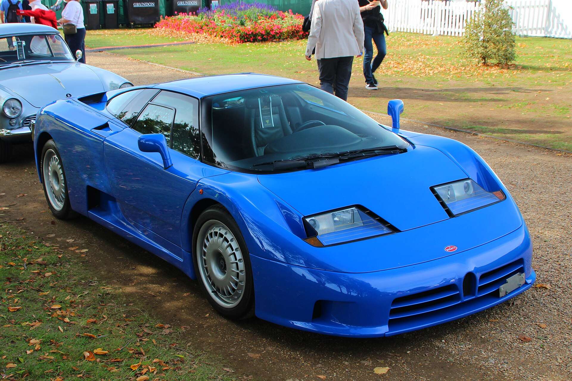 Bugatti EB110 photographed from the rear three-quarter showing its rear wing and quad exhaust
