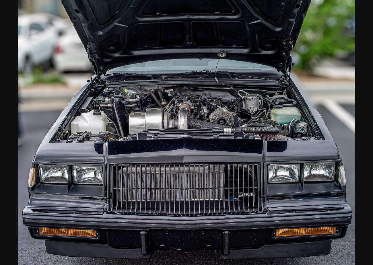 Turbocharged 3.8-liter Buick V6 engine bay with Garrett turbocharger and air-to-air intercooler visible
