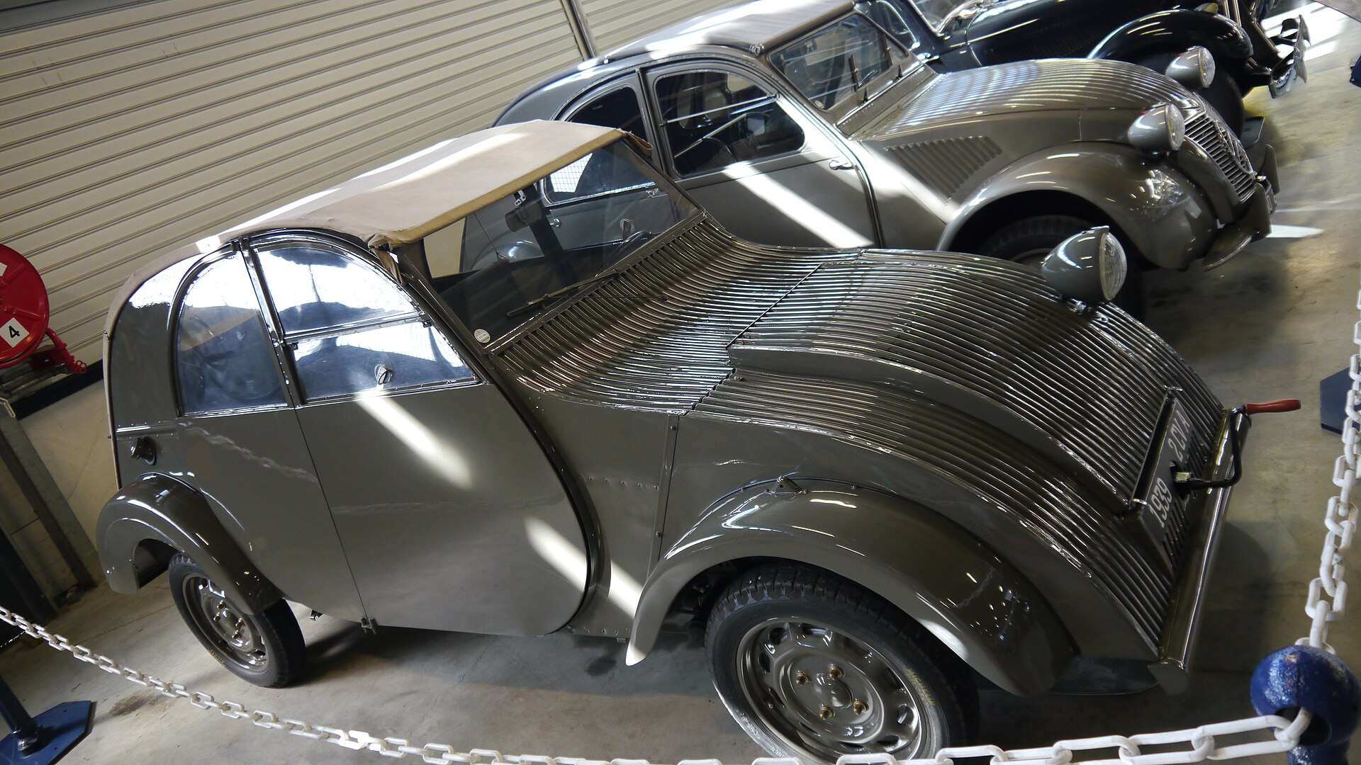 Early Citroën 2CV displayed at the Conservatoire Citroën heritage collection