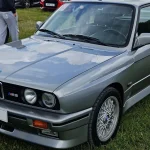 Silver 1989 BMW E30 M3 coupe front three-quarter view