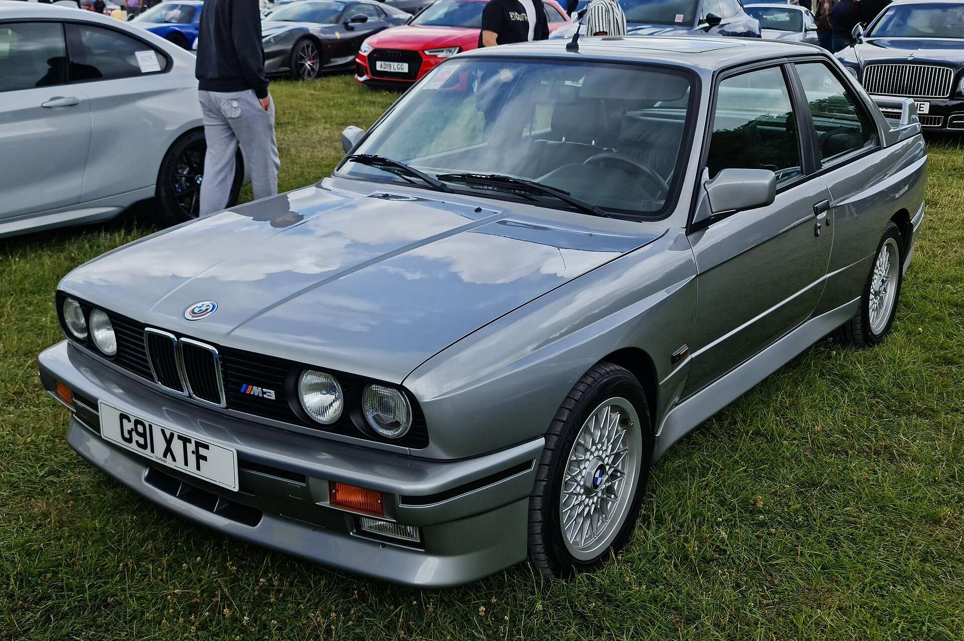 Silver 1989 BMW E30 M3 coupe front three-quarter view