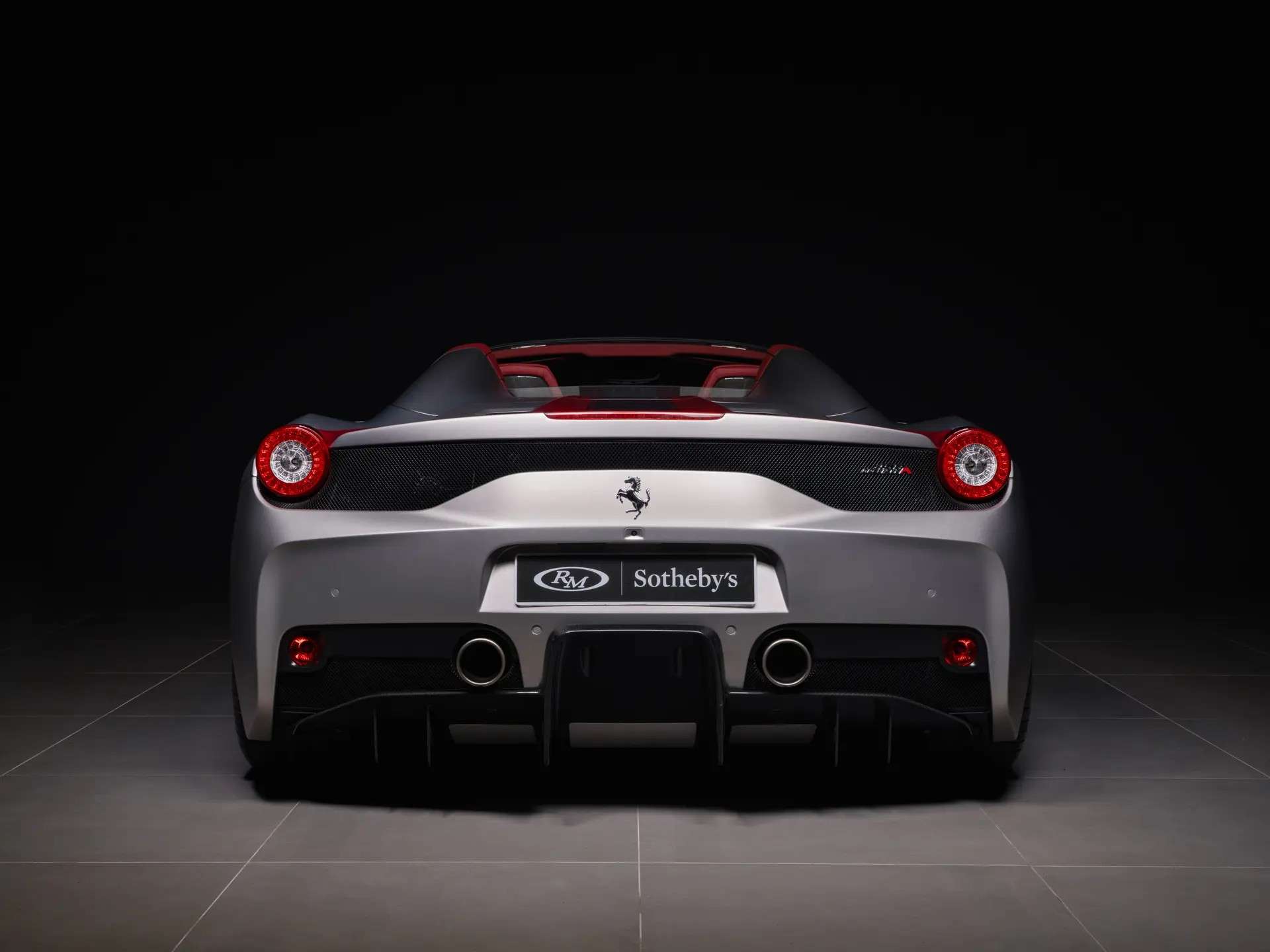 Rear view of the matte aluminum 458 Speciale A with its roof retracted