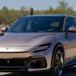 No Reserve: Tailor Made 2026 Ferrari Purosangue For Sale on Bring a Trailer Tailor Made 2026 Ferrari Purosangue front three-quarter view in Bronzo Masaru