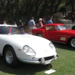 Car Collector News Round Up: Ferrari F50 Values, Gurney's Eagle, Hemi 'Cuda Paperwork and More Two classic Ferraris, one white and one red, displayed on the lawn at the Amelia Island Concours d'Elegance