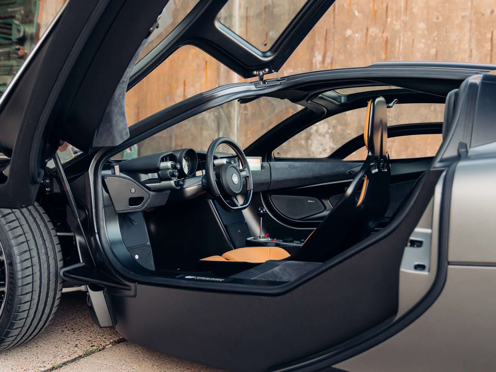 Gordon Murray T.50 chassis 047 with dihedral doors open showing the central driving seat