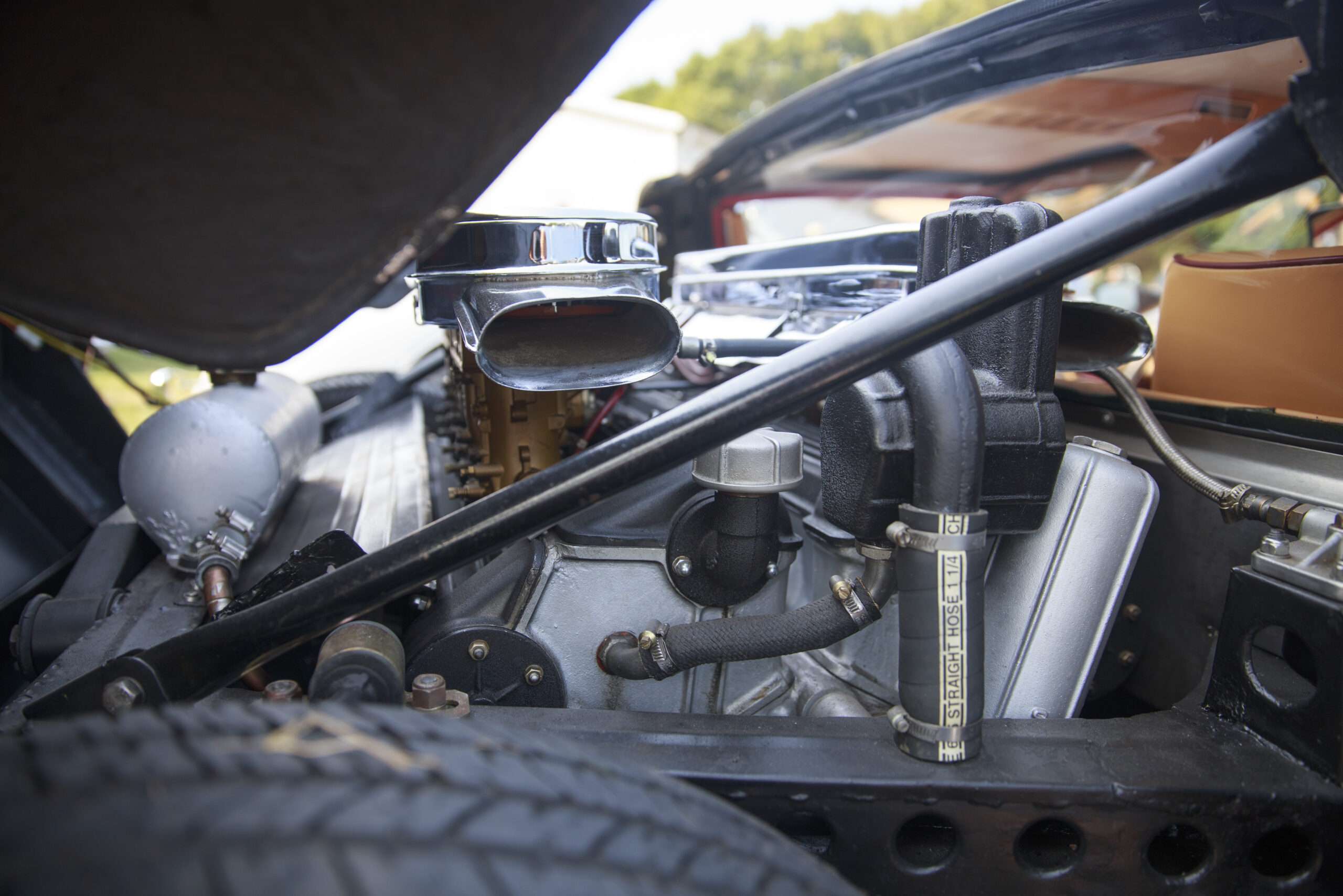 Engine bay of a Lamborghini Miura P400S, showing the transverse 3.9-liter V12 (not the actual auction car)