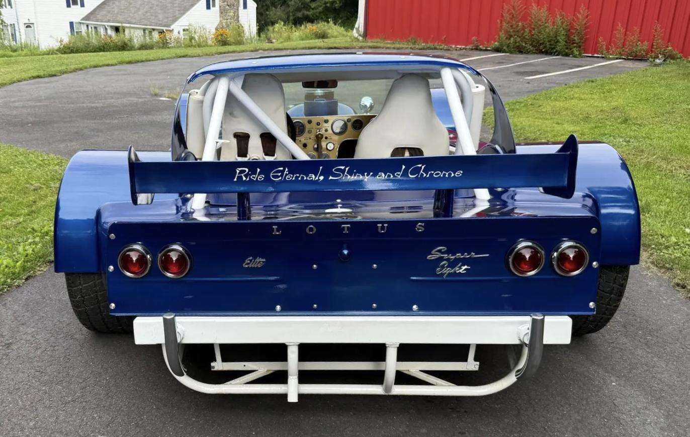 Rear of the special showing LOTUS script badging and the wing lettered Ride Eternal, Shiny and Chrome