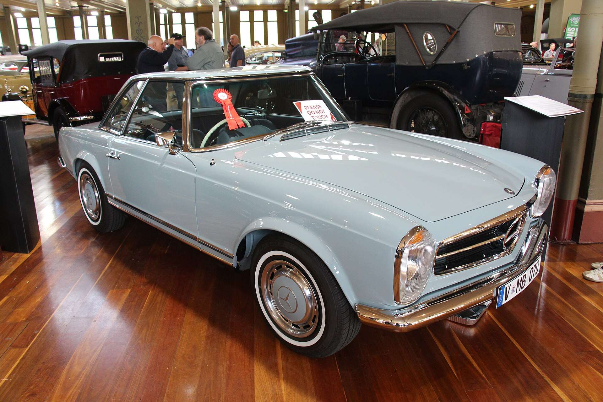 Light blue 1970 Mercedes-Benz 280 SL W113 roadster displayed without its hardtop