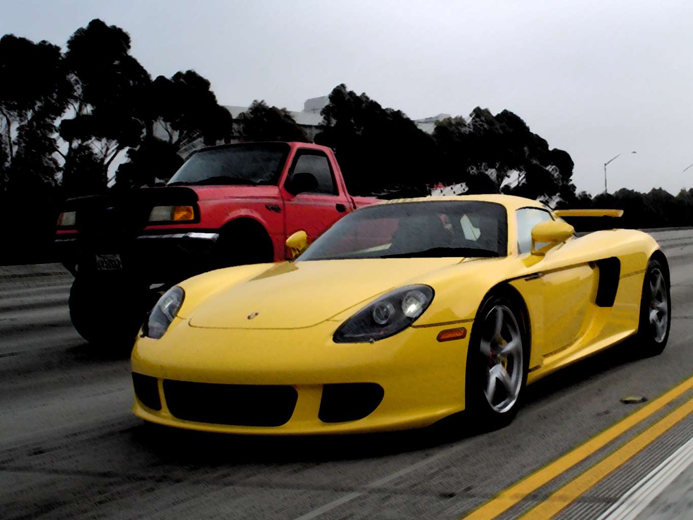 Fayence Yellow Porsche Carrera GT at an outdoor car event