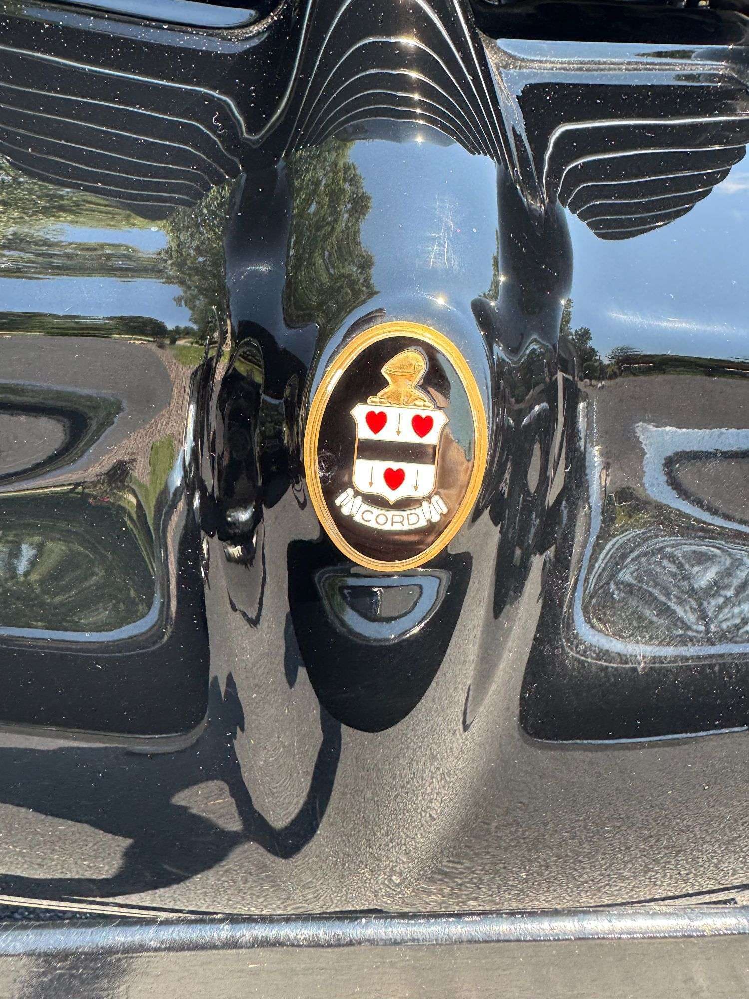 Cord crest emblem on the 1937 Cord 812 Supercharged Phaeton