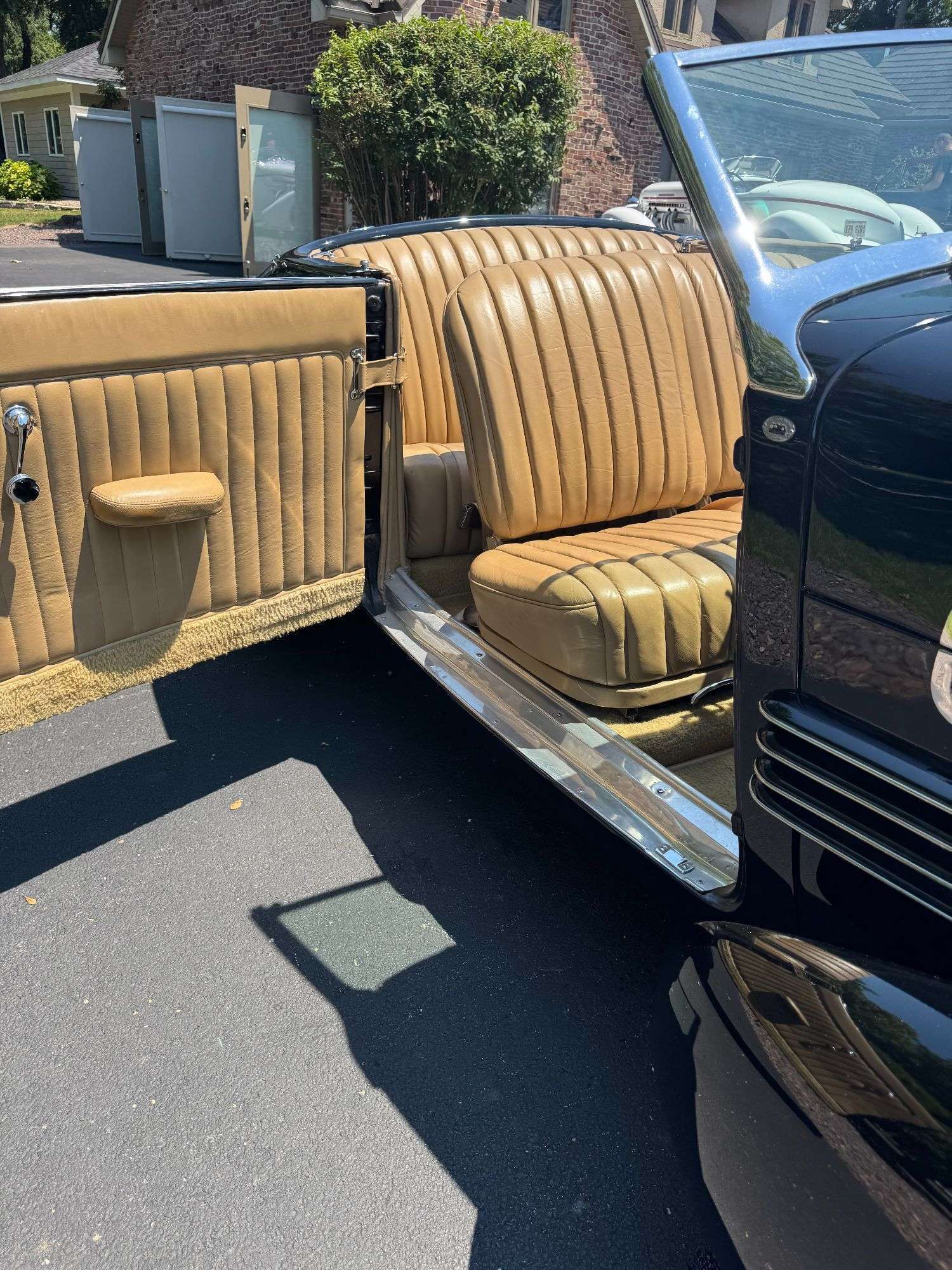 Tan leather front seat of the 1937 Cord 812 Supercharged Phaeton
