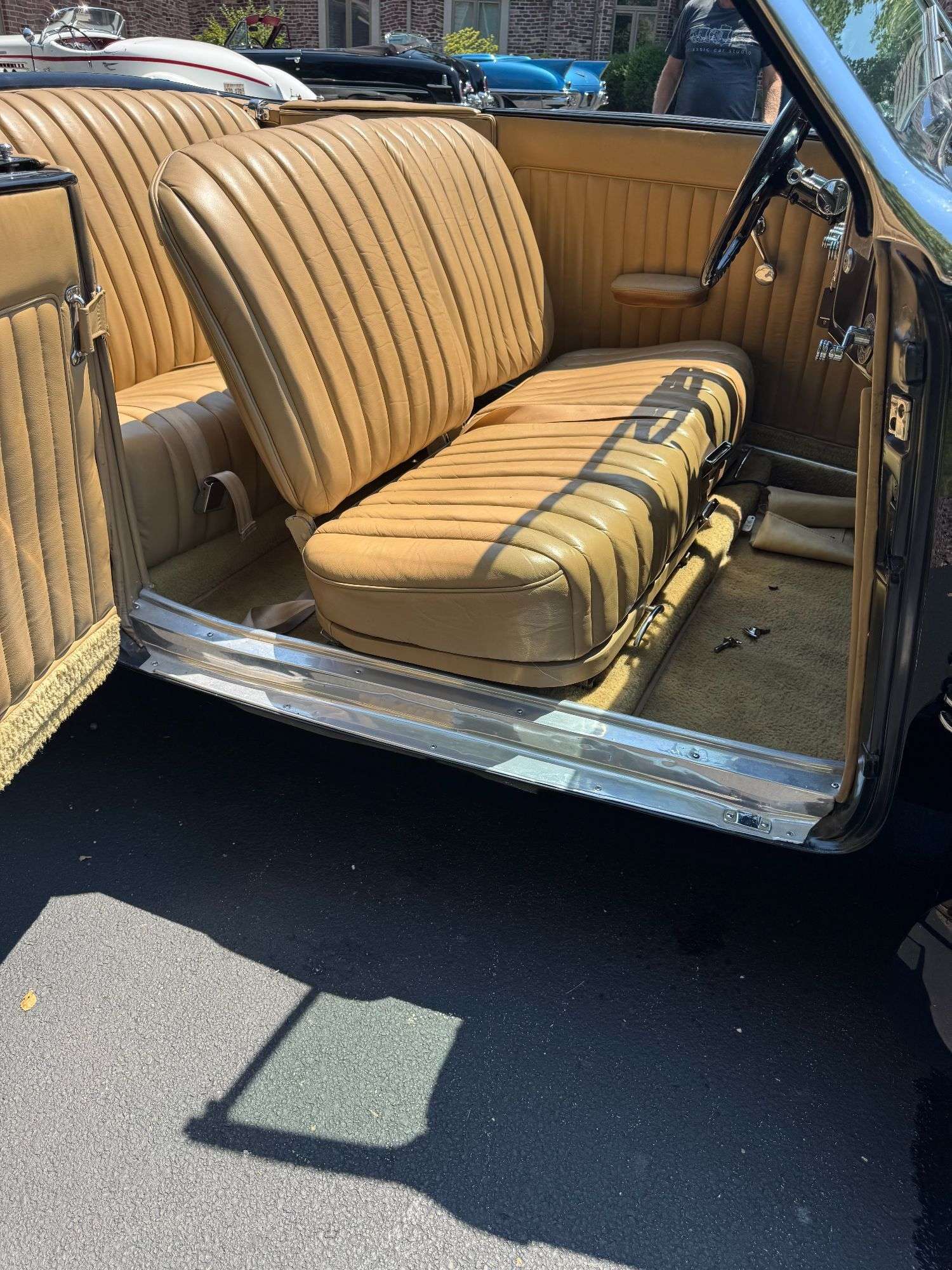 Tan leather rear seat of the 1937 Cord 812 Supercharged Phaeton