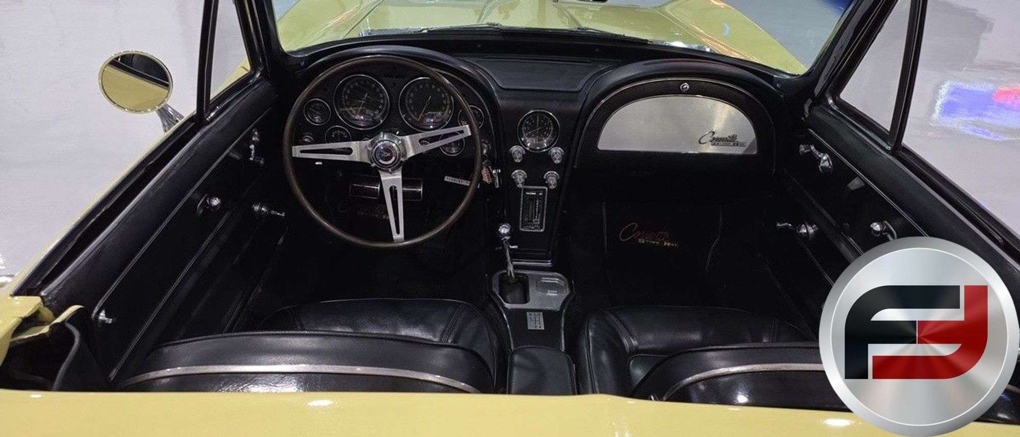 Black interior and dash of the 1965 Chevrolet Corvette convertible