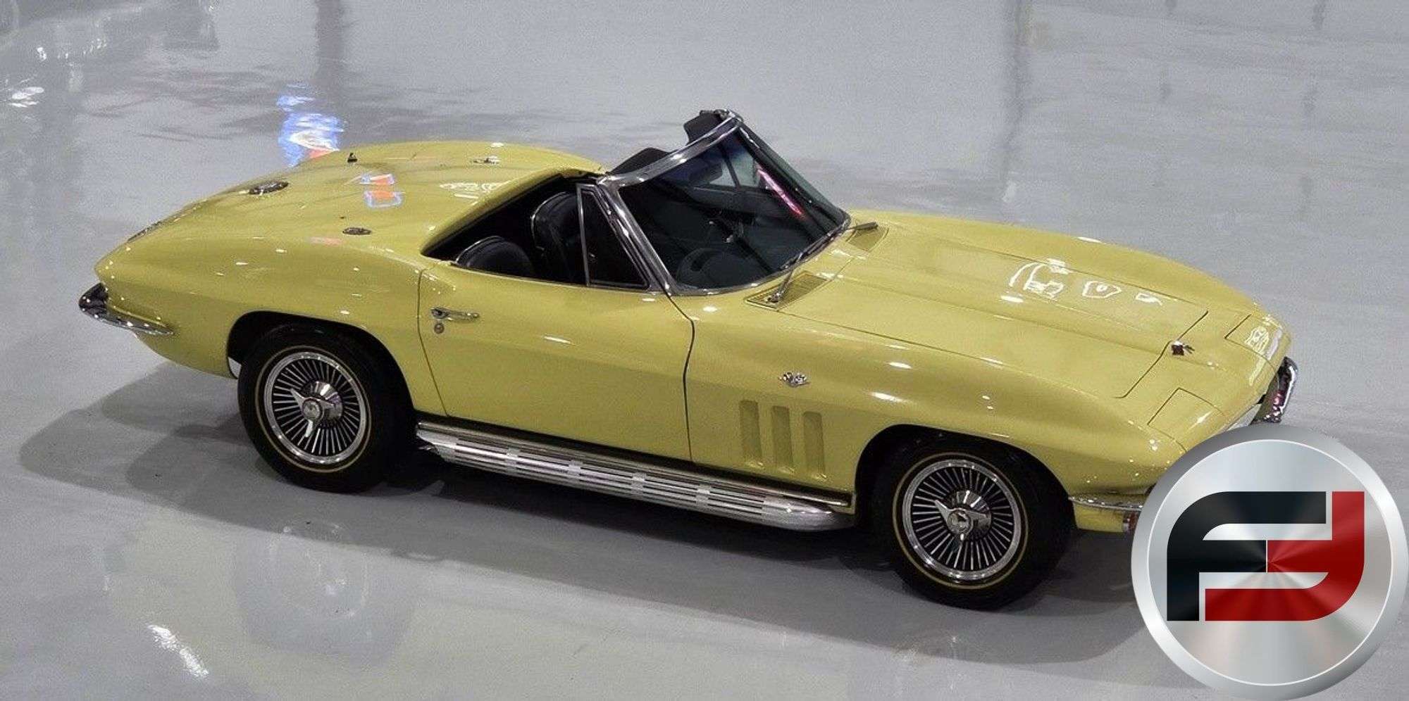 1965 Chevrolet Corvette Sting Ray convertible with the top down in Sunfire Yellow