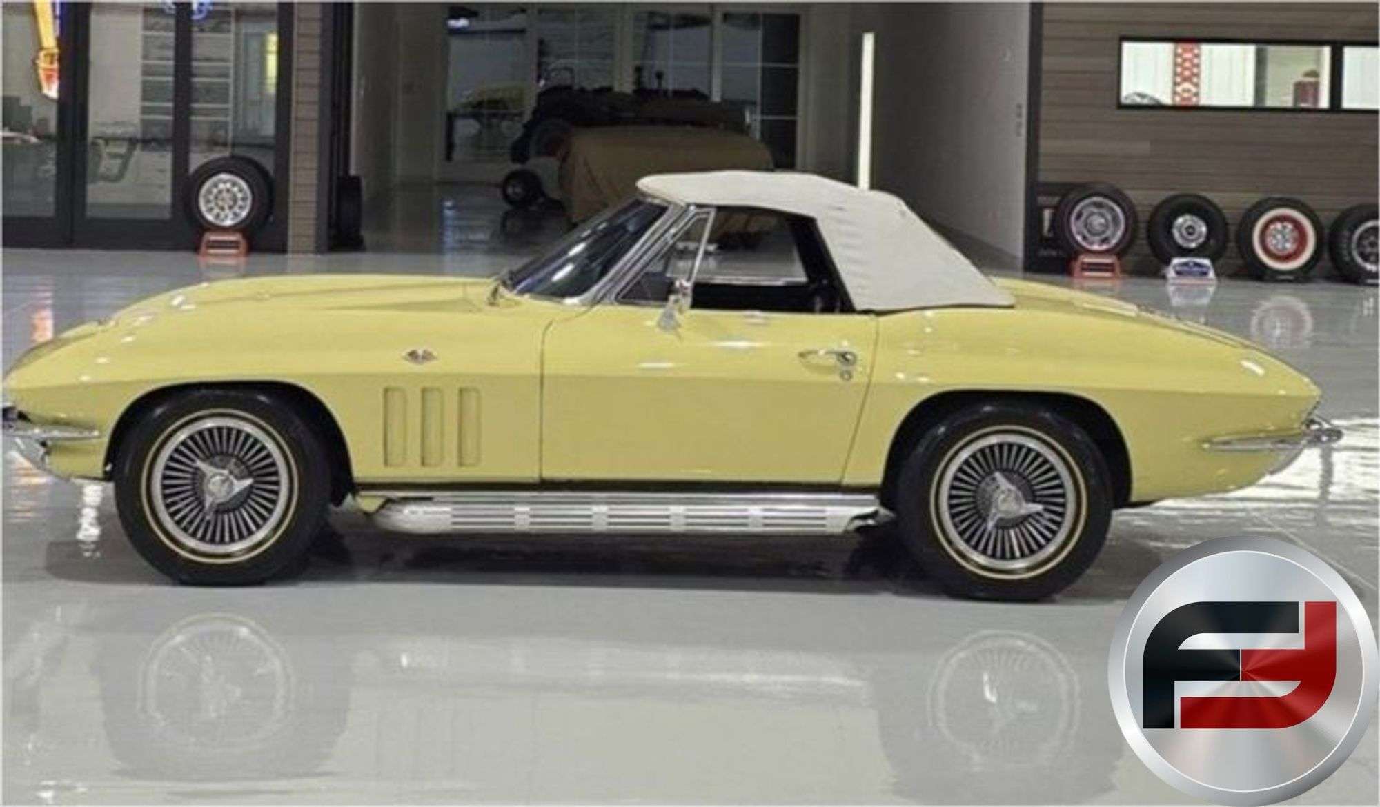 1965 Corvette Sting Ray convertible with white soft top up, side profile