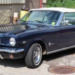 Today in Collector Car History: Lee Iacocca Is Born, and the Mustang Follows (Oct. 15, 1924) 1965 Ford Mustang convertible, front three-quarter view, the Ford Division model Lee Iacocca championed