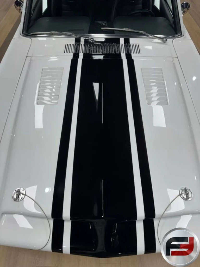 Fiberglass hood with painted Jet black stripes on the 1965 Mustang Eleanor tribute