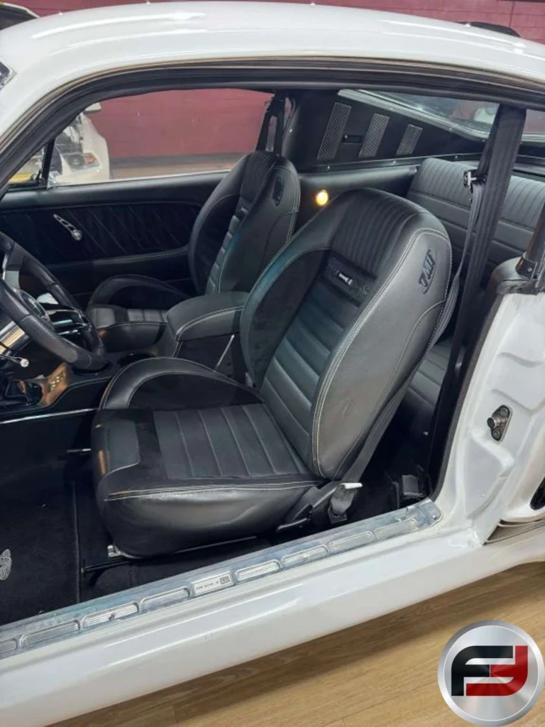 Custom TMI black interior and seats in the 1965 Mustang Eleanor tribute fastback
