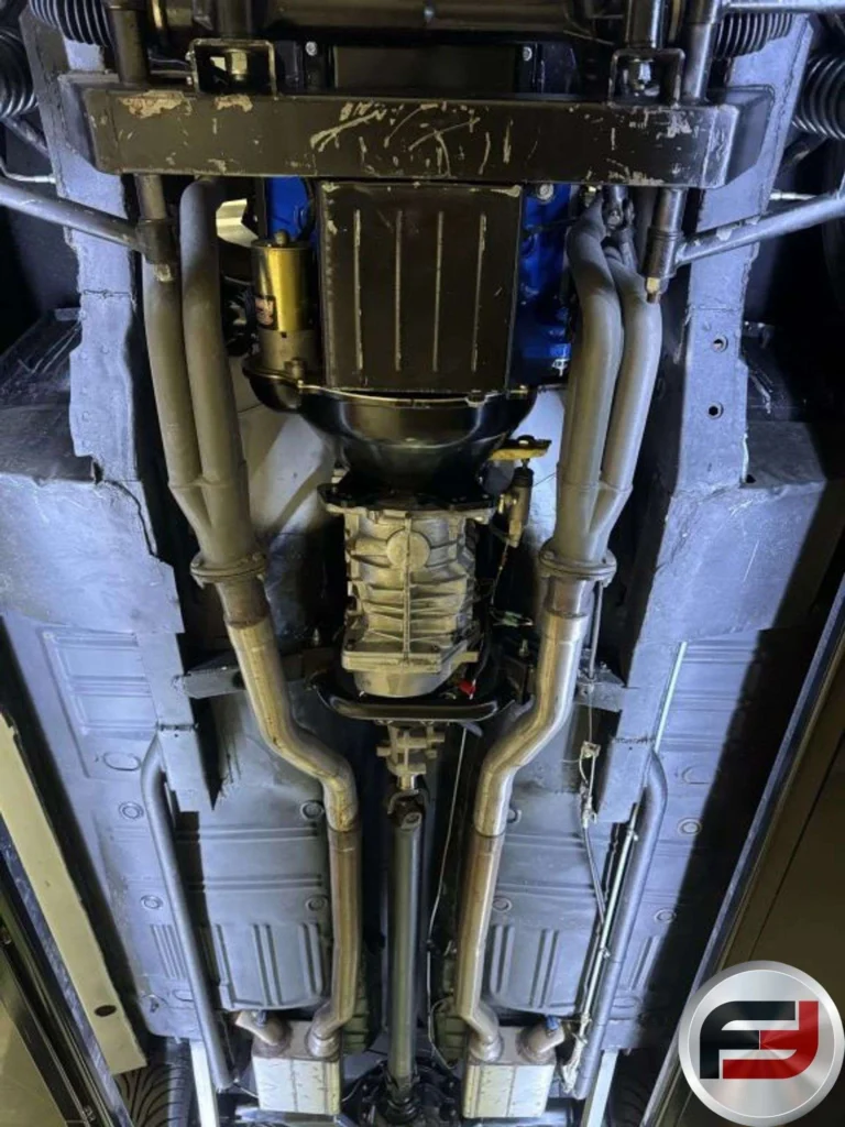 Undercarriage of the 1965 Mustang Eleanor tribute showing upgraded suspension and exhaust