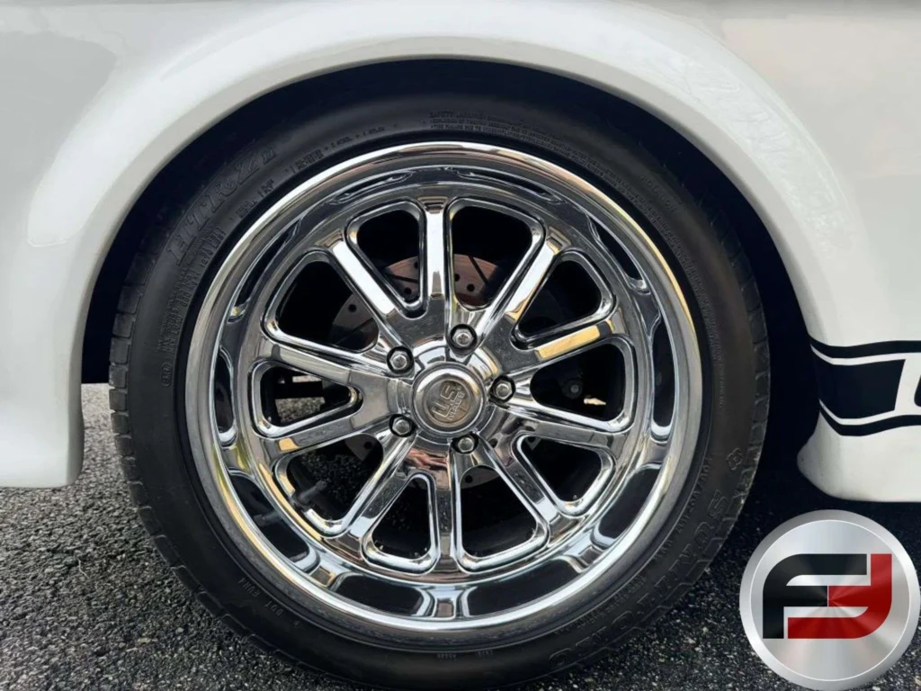 Chrome wheel and disc brake on the 1965 Mustang Eleanor tribute fastback