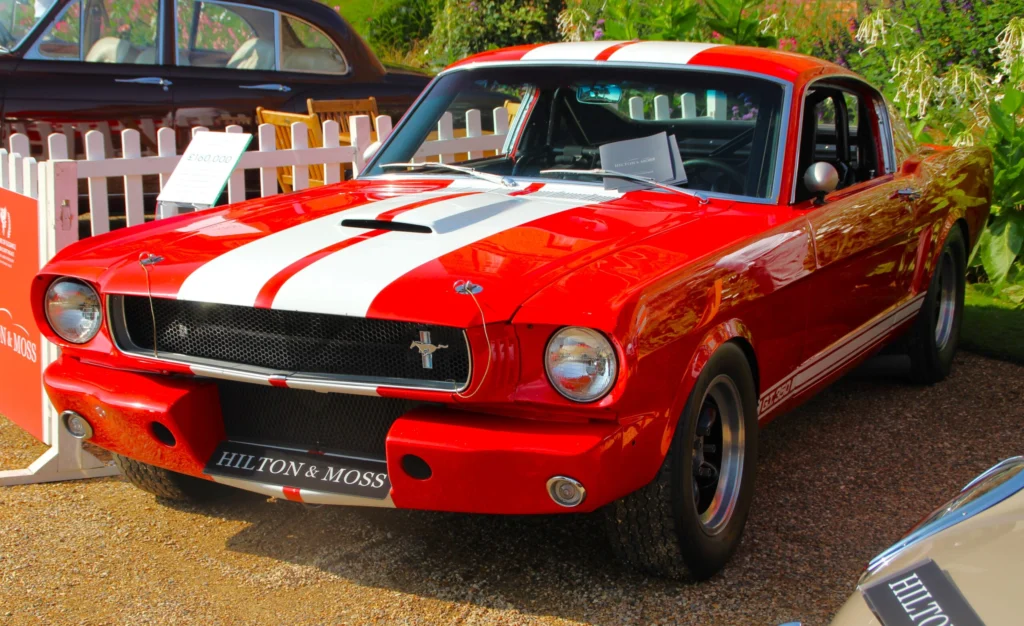 1966 Shelby GT350 Mustang with Le Mans stripes at a concours