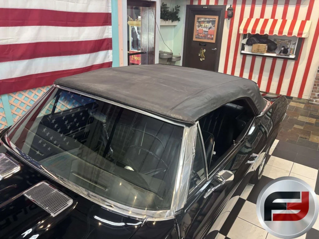 Black power convertible top in the raised position