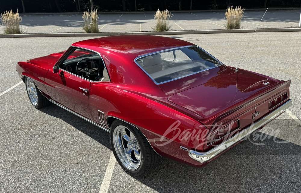 1969 Chevrolet Camaro Z/28 custom coupe side profile on 18-inch American Racing wheels
