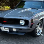 GAA Classic Cars Is Selling This LS-Powered 1969 Chevrolet Camaro With a Frame-Off Rotisserie Restoration Gray 1969 Chevrolet Camaro restomod front three-quarter view, offered at GAA Classic Cars