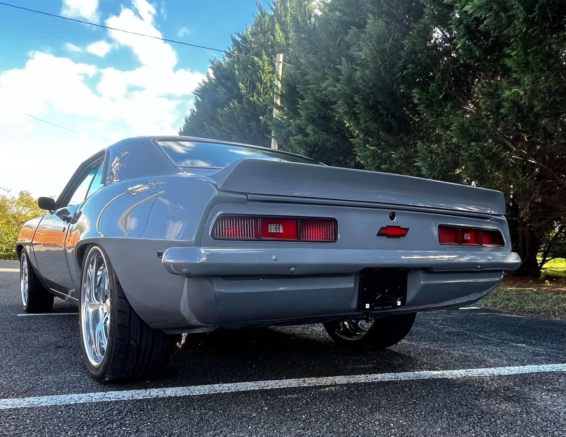 Rear view of the gray 1969 Chevrolet Camaro with powder coated back trim