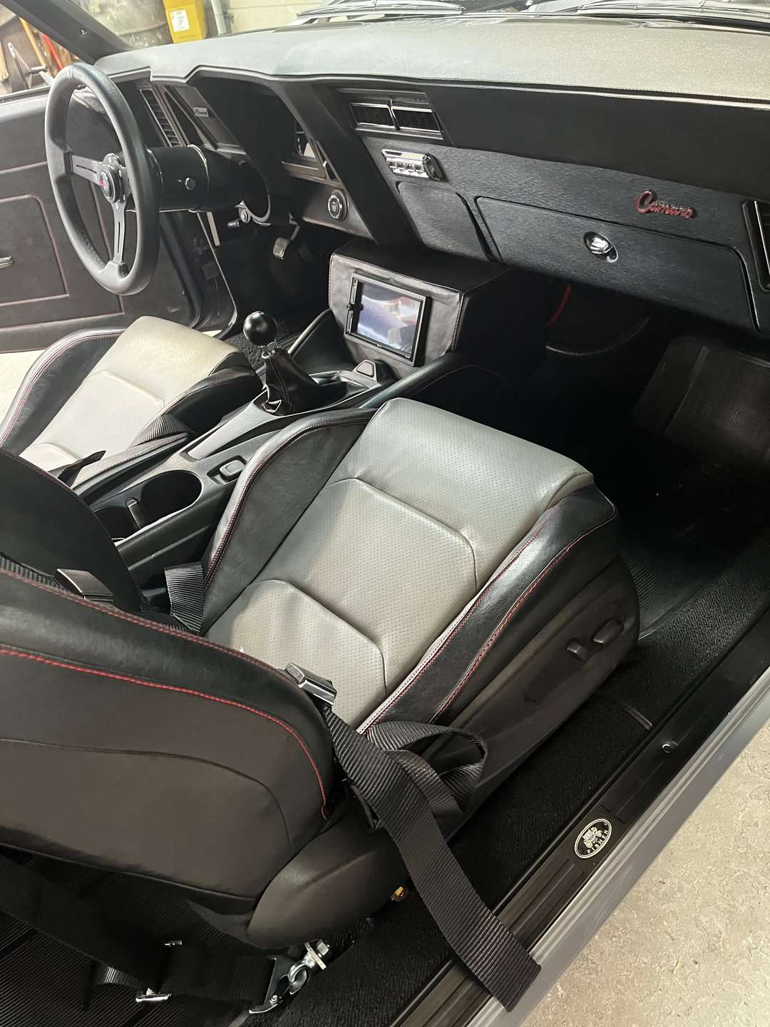 Black and gray custom interior and seats of the 1969 Camaro