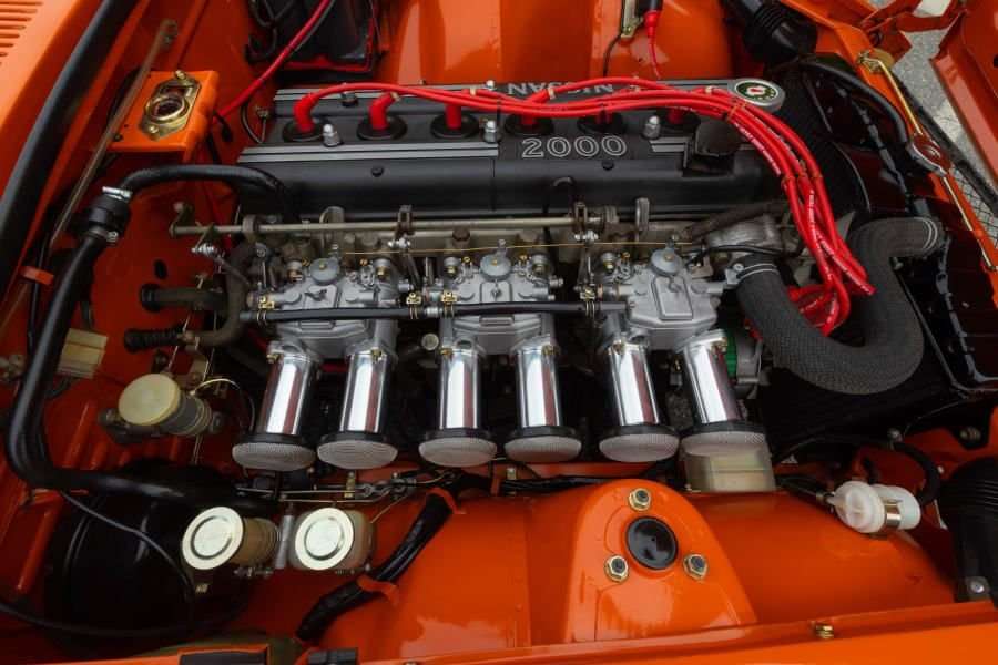 Three Mikuni-Solex carburetors on the Datsun Fairlady Z432 S20 engine
