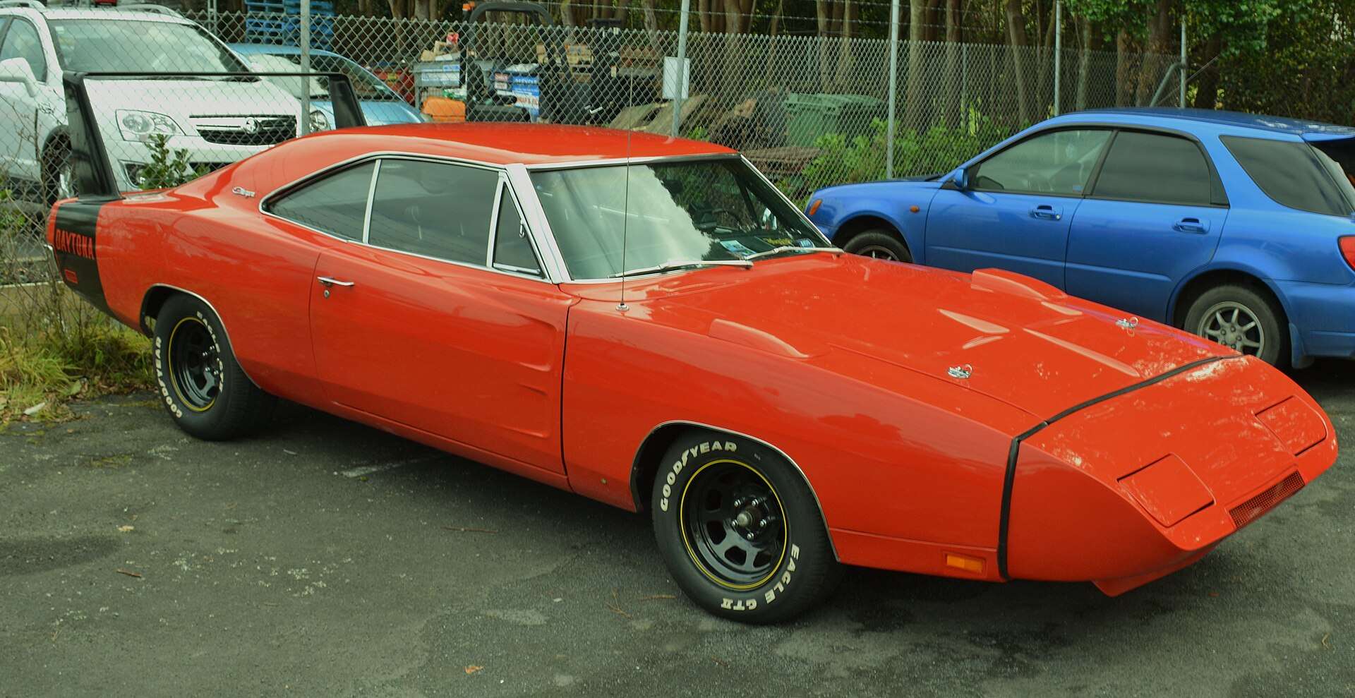 Orange 1969 Dodge Charger Daytona parked outdoors