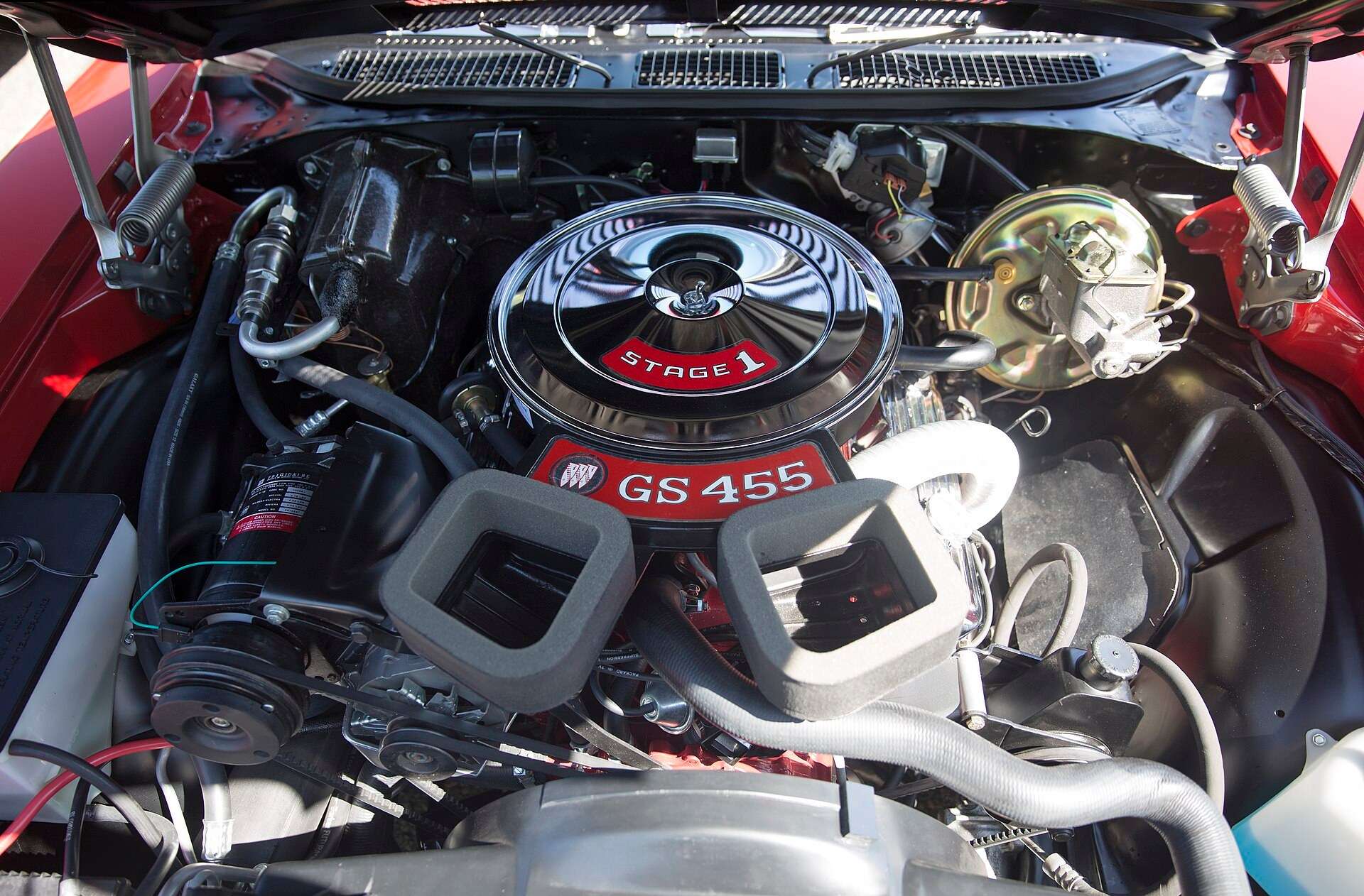 Engine bay of a 1970 Buick GS 455 Stage 1 with a chrome air cleaner carrying a Stage 1 decal