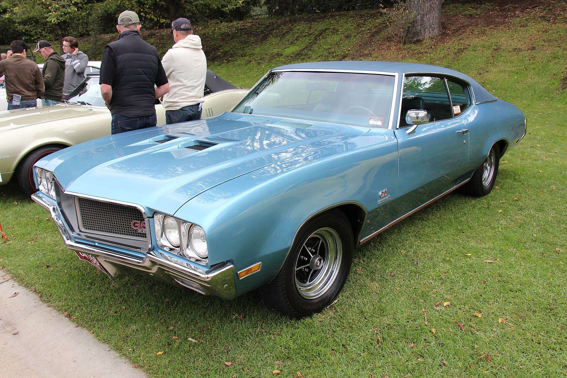 Light blue 1970 Buick GS 455 Stage 1 coupe with a hood scoop, shown without any GSX stripes or wing