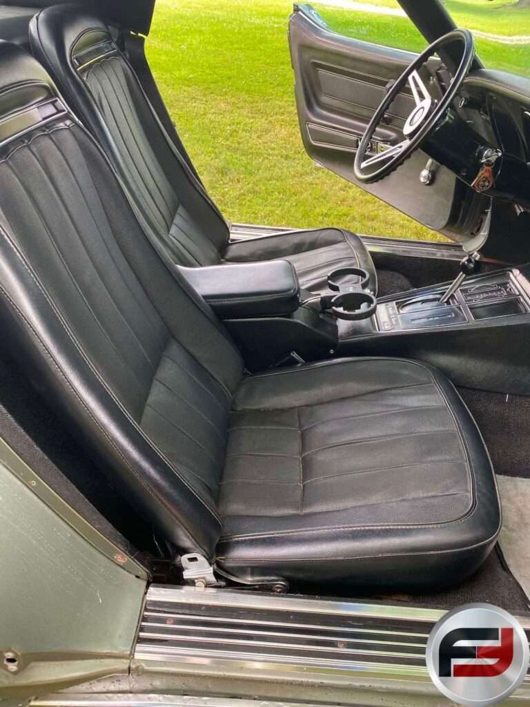 Black vinyl bucket seats inside the 1972 Chevrolet Corvette convertible