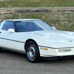 VIN 0001 Is Back. Can Being First Be Sold Twice? White 1984 Chevrolet Corvette VIN 0001 front three-quarter view at GAA Classic Cars