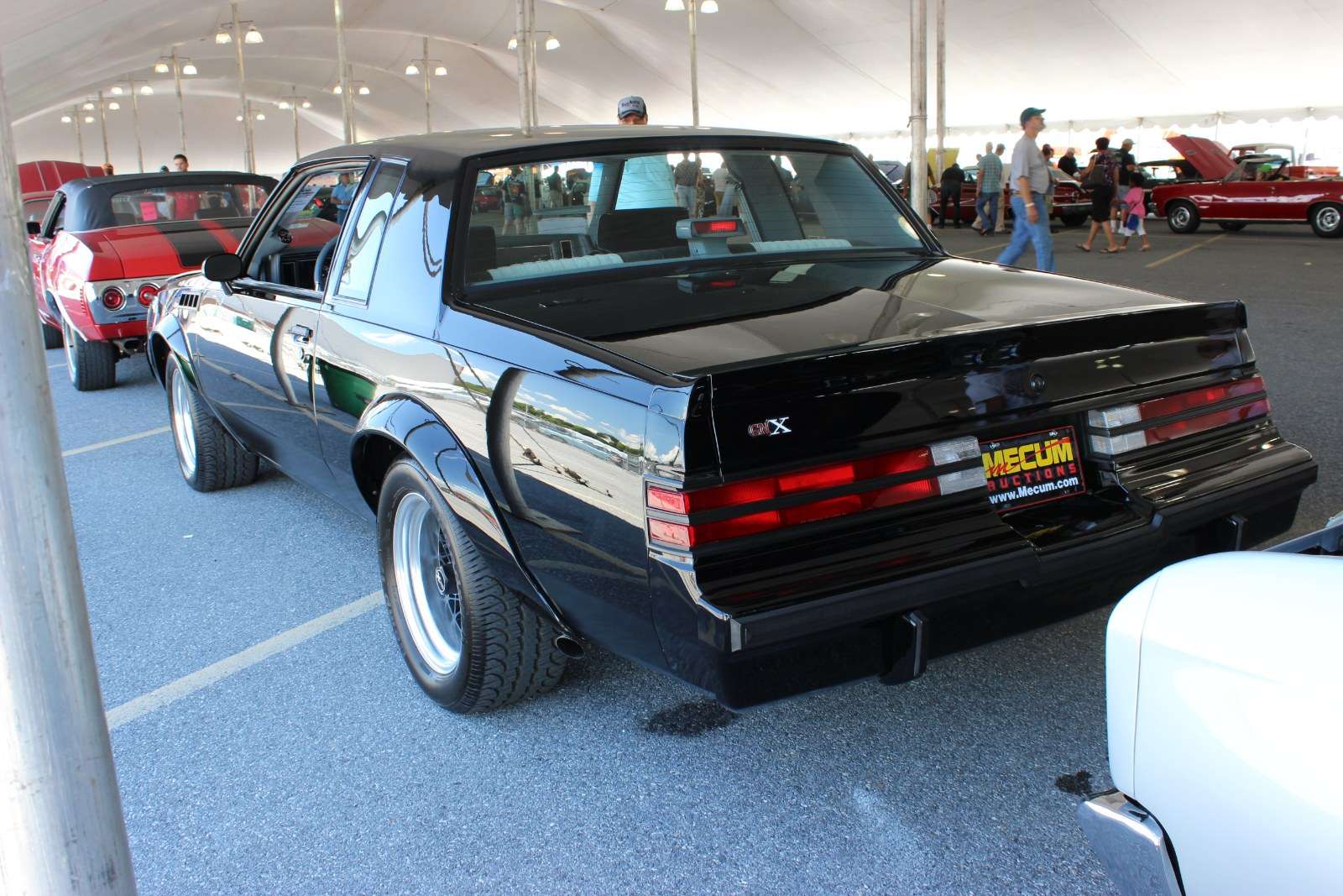 Rear view of a black 1987 Buick GNX showing its rear bumper and exhaust