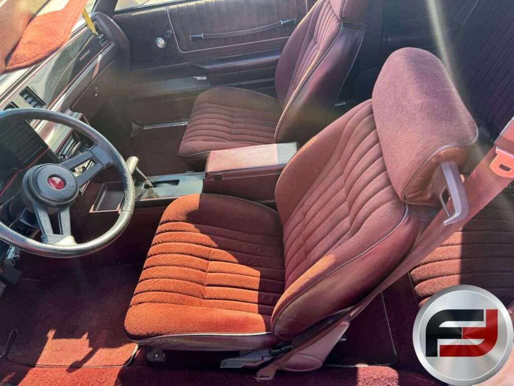 Front bucket seats and sport steering wheel in the 1987 Monte Carlo SS Aerocoupe
