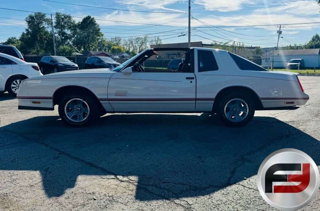 Driver-side profile of the white 1987 Chevrolet Monte Carlo SS Aerocoupe
